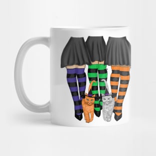 Three Witches Wearing Long Stripe Socks and Two Cats Mug